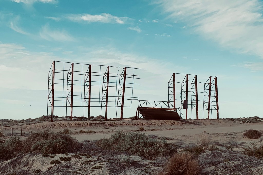 Decaying billboard on the coastline of Puerto Peñasco, March '23. Photograph: David J. Cross © 3:2 ratio